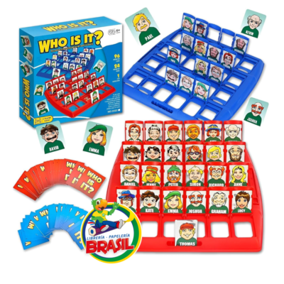 Set del juego Who Is It? con tableros rojo y azul, tarjetas de personajes y caja original de Librería Brasil.